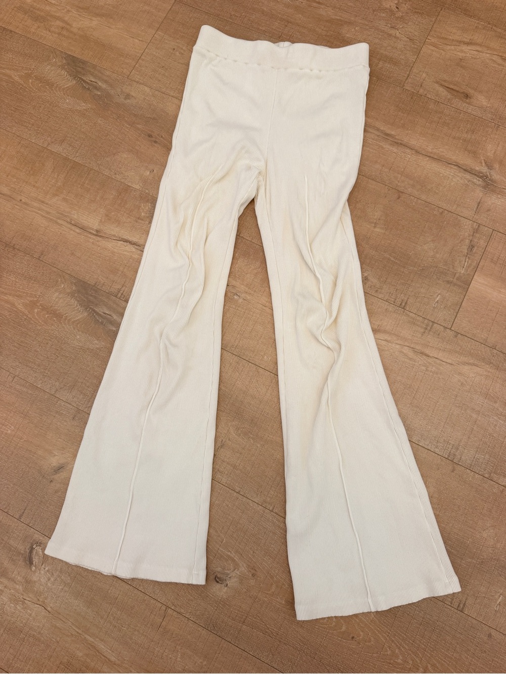 DONNI. Cream Kick Flared Knit Pants